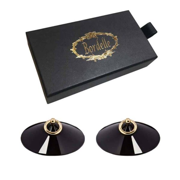 BORDELLE O Enamel Nipplets Black Nippies cache-tétons noir avec anneau central doré BORDELLE chez Brigade Mondaine