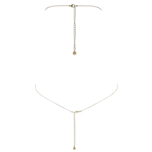 Bijou de corps en or fait à la main avec étoiles filantes pendant et croisé entre les seins FUNGI chez Brigade Mondaine