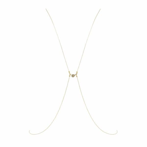 Packshot der Vorderseite eines vergoldeten Büstenschmucks mit Swarovski-Schmuck und Perlmuttperlen