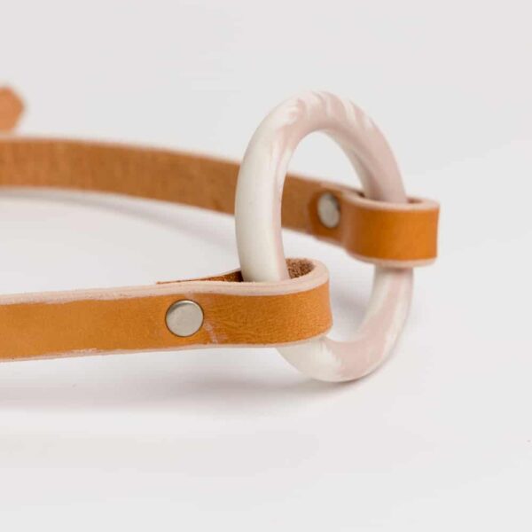Necklace OYA orange ring Marble in the center of the necklace made in pink and white porcelain d' adele brydges chez brigade mondaine.