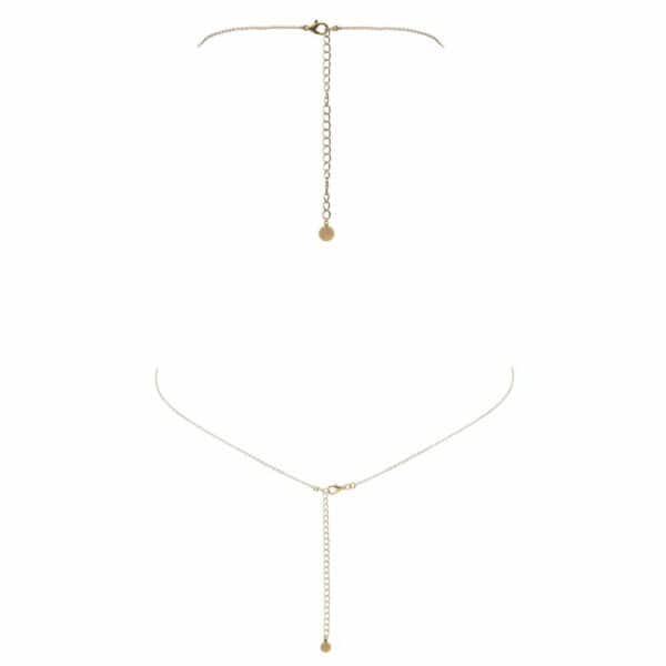Produktfoto der Rückseite eines goldenen Brustschmucks mit Swarovski-Steinen und Kreuz