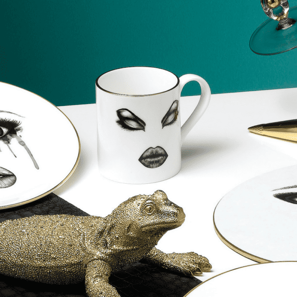 LDC - Prima Donna Tasse Cup in white Chinese porcelain and precise black felt depicting the prima donna's face in make-up, eyes closed, lips full.
