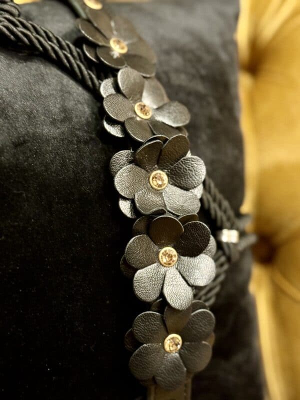 Black leather collar with flower design
