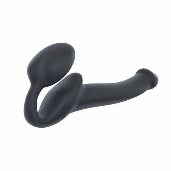 STRAP-ON-ME - Strap-on Original Black The 2019 award-winning non-vibrating strap-on combines ultra-soft silicone and a flexible memory neck for exceptional comfort. It simultaneously stimulates the clitoris and G-spot thanks to its egg-shaped part. Its ergonomic design adapts perfectly to your anatomy for a unique experience. Flexible and durable, it guarantees optimal stimulation.