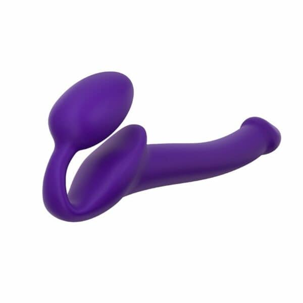 STRAP-ON-ME - Strap-on Original Violet Le strap-on non vibrant, primé en 2019, combine silicone ultra-doux et cou flexible à mémoire de forme pour un confort exceptionnel. Il stimule simultanément le clitoris et le point G grâce à sa partie œuf. Son design ergonomique s’adapte parfaitement à votre anatomie pour une expérience unique. Souple et durable, il garantit une stimulation optimale.
