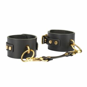 Esposas de cuero marrón con eslabón de cuero y metal dorado