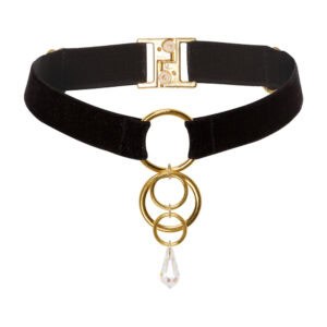 Foto de portada de una gargantilla negra con anillos de cristal dorado y blanco