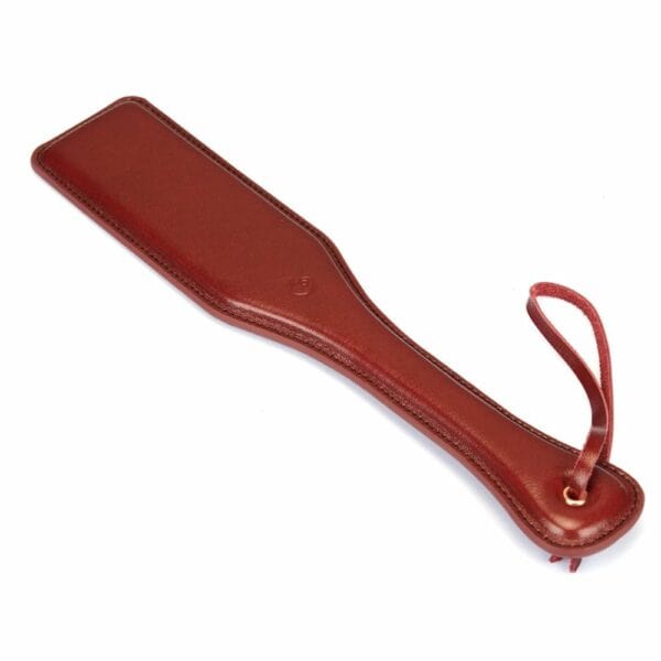Packshot of a Red Leather Paddle