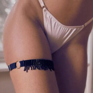 3/4" woman wearing a Black Elastic Garter with Black Strass Fringes