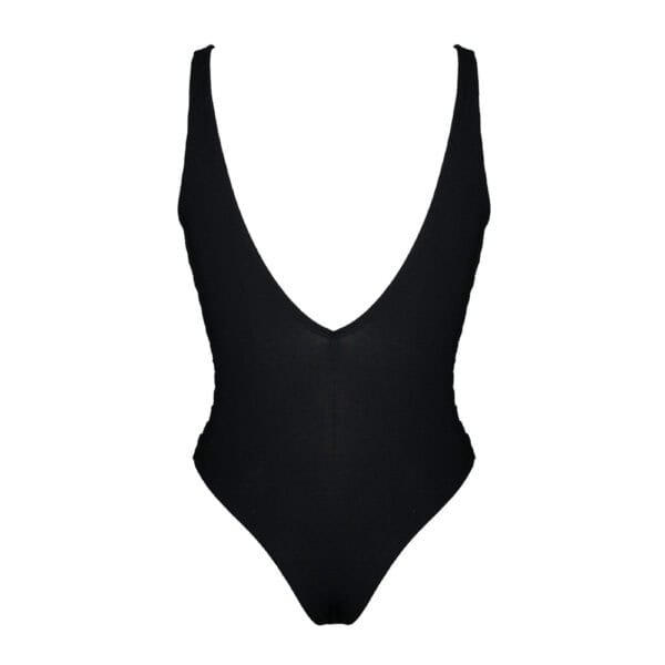 LALITA - Body Accented Der zart anliegende Body aus schwarzem Stoff betont die weiblichen Kurven und bietet gleichzeitig ein raffiniertes Design mit einem tief ausgeschnittenen Rücken. Dieses elegante und zugleich gewagte Wäschestück verkörpert Sinnlichkeit und Chic und sorgt für eine ebenso verführerische wie raffinierte Silhouette.