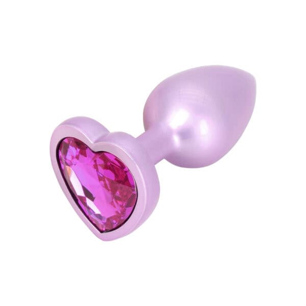 Plug anal Time to Shine en aluminium mauve avec pierre violette scintillante en forme de cœur, design élégant et confortable.