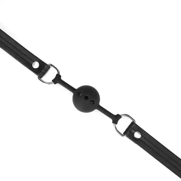 Breathable ball gag from the Black Bond collection, with a perforated silicone ball for optimum comfort. Black recycled leather straps for intense, long-lasting submission.