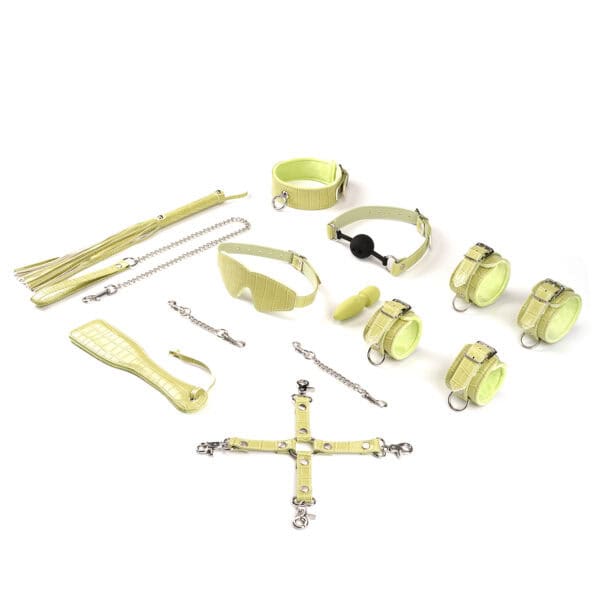 Melon Yellow Macaroon Bondage Kit LIEBE SEELE, 9 pieces: headband, ball gag, collar with leash, wrist and ankle cuffs, paddle, flogger, hogtie, mini massager, melon yellow imitation leather, adjustable buckles.