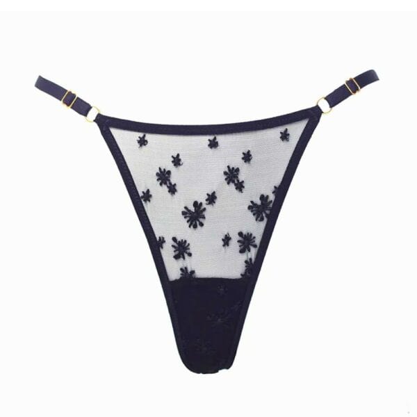 Black adjustable thong embroidered with stars in French embroidered tulle and satin-finished elastic rings and 24k gold-plated sliders crotch is lined in soft rayon jersey