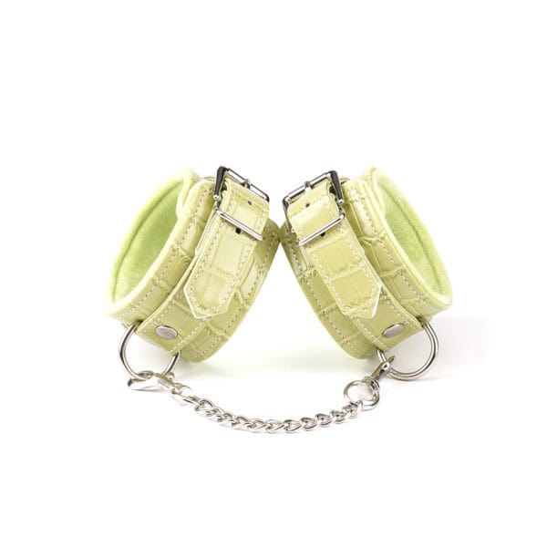 Melon Yellow Macaroon Bondage Kit LIEBE SEELE, 9 pieces: headband, ball gag, collar with leash, wrist and ankle cuffs, paddle, flogger, hogtie, mini massager, melon yellow imitation leather, adjustable buckles.