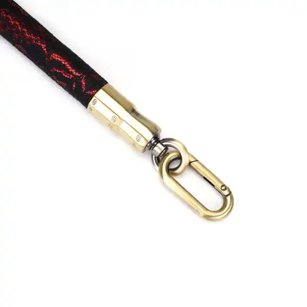 50 cm spacer bar in Red Leatherette covered in Black Lace with gold metal details and fasteners
