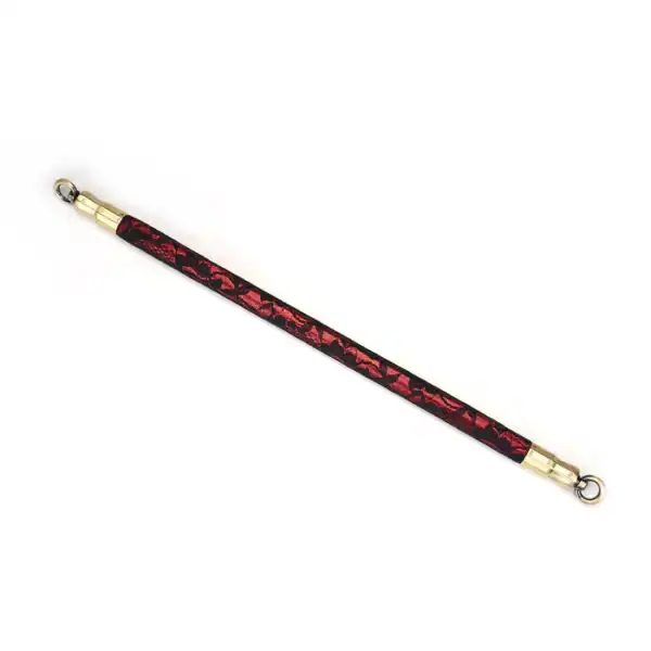 50 cm spacer bar in Red Leatherette covered in Black Lace with gold metal details and fasteners