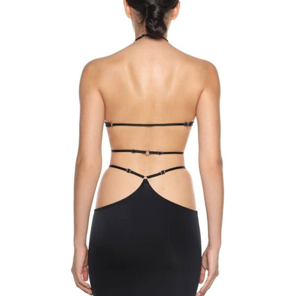 Stellare Anoeses set featuring a halter top with adjustable straps and a slit skirt in fluid biflex - graphic design, metal rings, sensual cut and handcrafted.