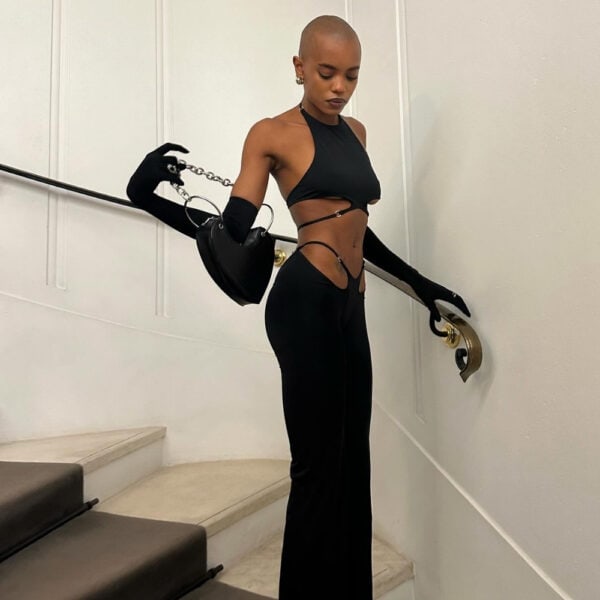 Stellare Anoeses set featuring a halter top with adjustable straps and a slit skirt in fluid biflex - graphic design, metal rings, sensual cut and handcrafted.