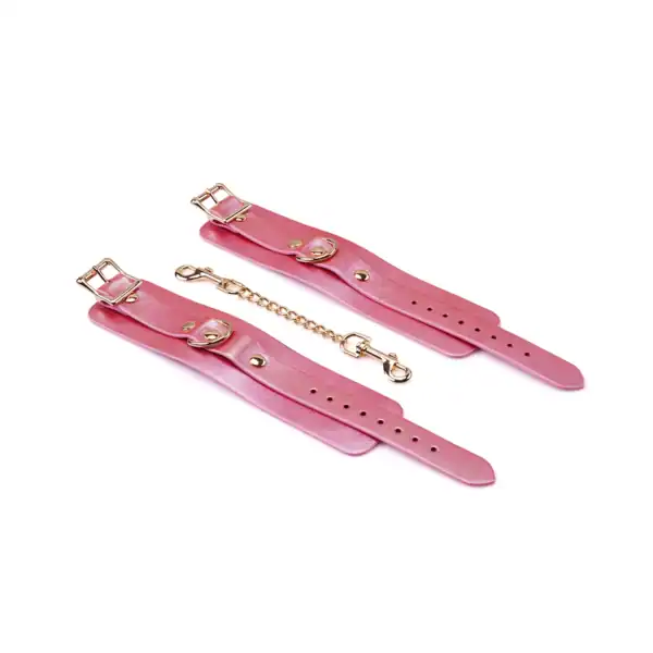 Handfesseln aus rosafarbenem, irisierendem Leder mit goldenen Schnallen und abnehmbarer Kette Lustre Rosa