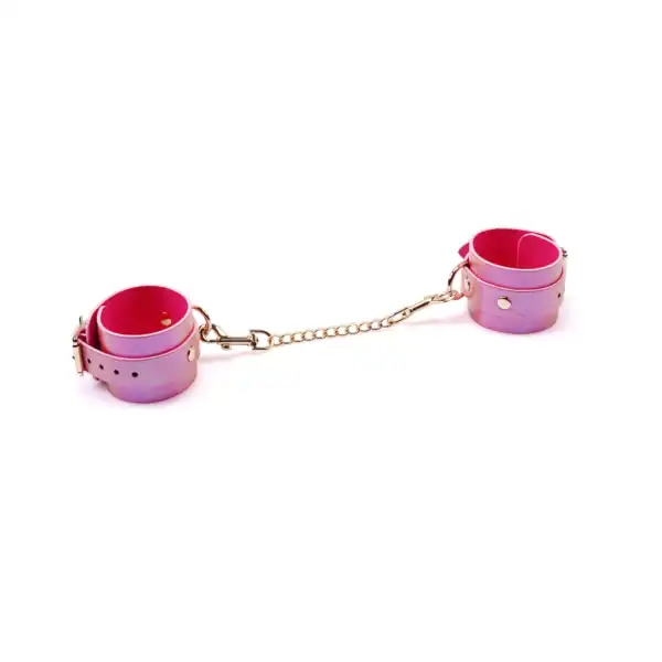 Handfesseln aus rosafarbenem, irisierendem Leder mit goldenen Schnallen und abnehmbarer Kette Lustre Rosa