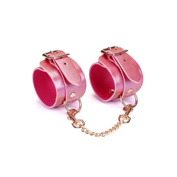 Handfesseln aus rosafarbenem, irisierendem Leder mit goldenen Schnallen und abnehmbarer Kette Lustre Rosa