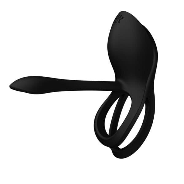 Vibromasseur portable au design ergonomique présenté avec son écrin, posé sur un décor aux nuances bleues et rouges, sélection Brigade Mondaine Paris.