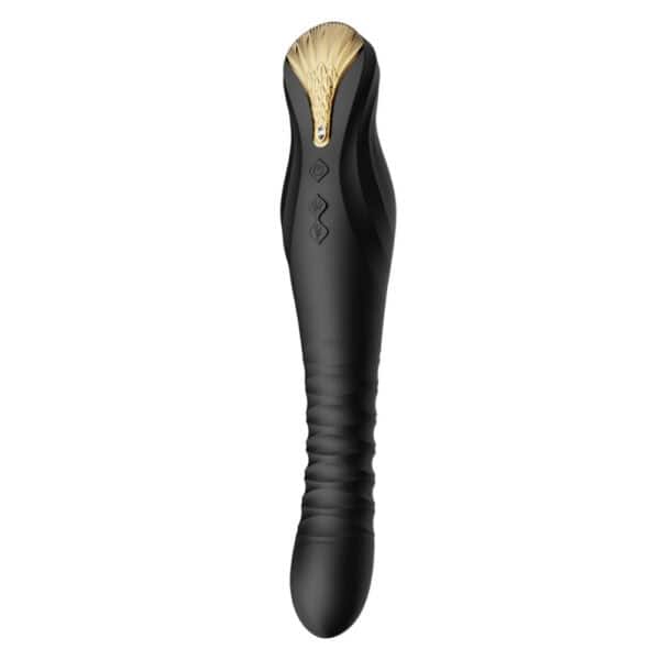 Schwarzer Stimulator aus strukturiertem Silikon mit goldenem Finish, vertikal auf dunklem Hintergrund dargestellt, angeboten von Brigade Mondaine Paris.