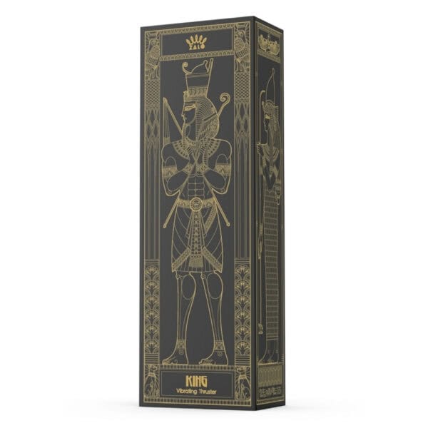 Schwarzer Stimulator aus strukturiertem Silikon mit goldenem Finish, vertikal auf dunklem Hintergrund dargestellt, angeboten von Brigade Mondaine Paris.
