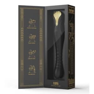 Estimulador de silicona negra texturizada con acabado dorado, presentado verticalmente sobre fondo oscuro, ofrecido por Brigade Mondaine Sextoys Electriques Paris.