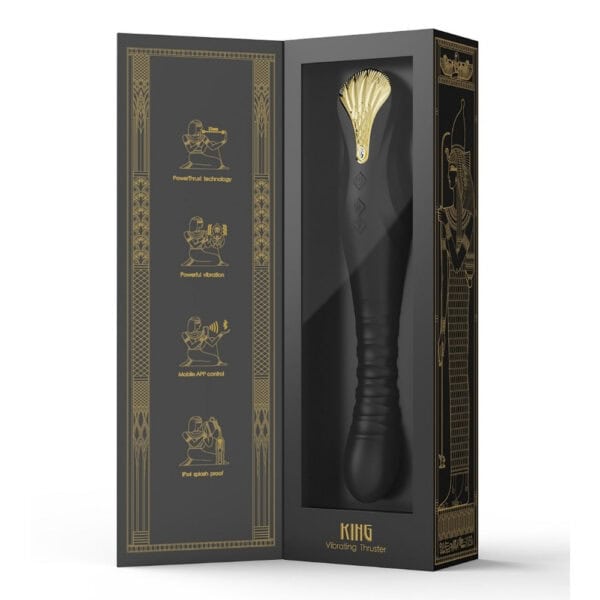 Schwarzer Stimulator aus strukturiertem Silikon mit goldenem Finish, vertikal präsentiert auf dunklem Hintergrund, angeboten von Brigade Mondaine Elektrische Sextoys Paris.