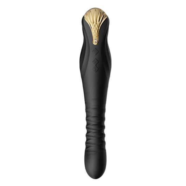 Schwarzer Stimulator aus strukturiertem Silikon mit goldenem Finish, vertikal auf dunklem Hintergrund dargestellt, angeboten von Brigade Mondaine Paris.