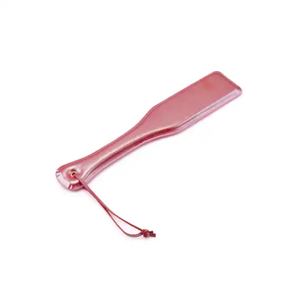 LIEBE SEELE Paleta rosa Lustre con superficie rosa brillante y forma alargada, con correa de sujeción a juego, presentada sobre fondo blanco en vista detallada del producto
