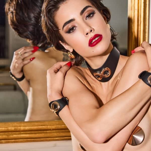 SEVERA IINFYNII handcuffs in black leather with metal rings, set of adjustable bracelets with graphic design, high-end body accessory, selection Brigade Mondaine Paris