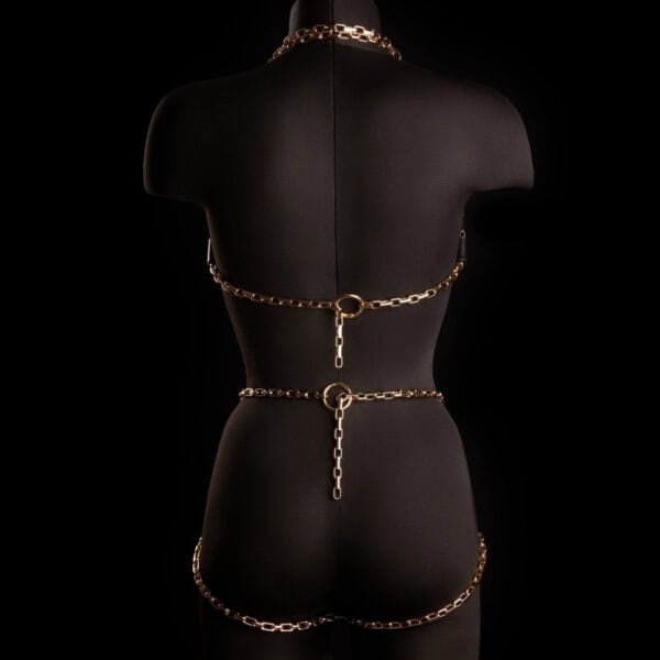 ARIA IINFYNII open knickers in black leather with gold chains and infinity symbol, graphic and structured piece, selection Brigade Mondaine Paris