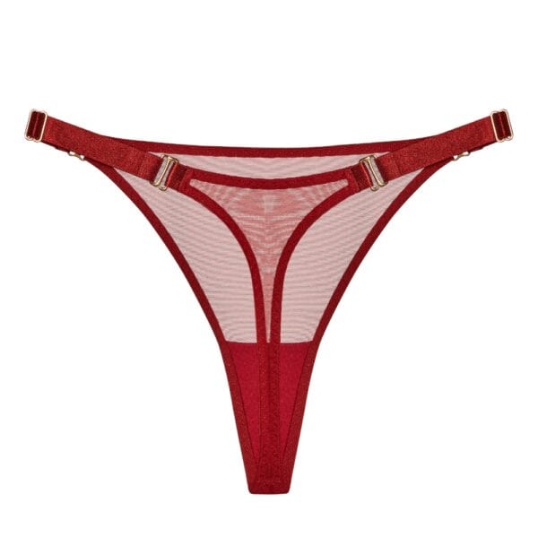 BORDELLE - String Mesh bei Brigade Mondaine Paris BORDELLE Mesh String, dreiviertel hinten gesehen, aus transparentem Tüll mit schmalem, elastischem Bund und goldenen Metallbeschlägen, präsentiert bei Brigade Mondaine Paris.