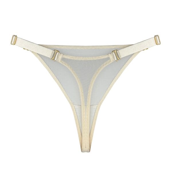 BORDELLE - String Mesh Cream chez Brigade Mondaine Paris Three-quarter length BORDELLE Mesh Cream thong in ivory sheer tulle with thin elastic waistband and gold metallic trim, presented at Brigade Mondaine Paris.