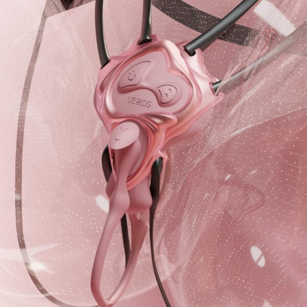 Detailed view of a pink UEROS vibrator, showing the control buttons and ergonomic shape, against a pinkish graphic background.