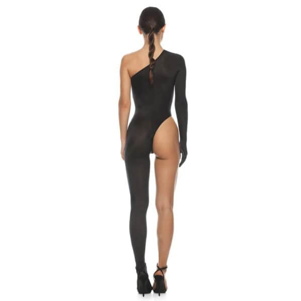 Artistic black and white view of an ANOESES asymmetrical black dress, cut close to the body with high slit and single sleeve, worn by a female model, minimalist aesthetic and high-end fetish Brigade Mondaine Paris.