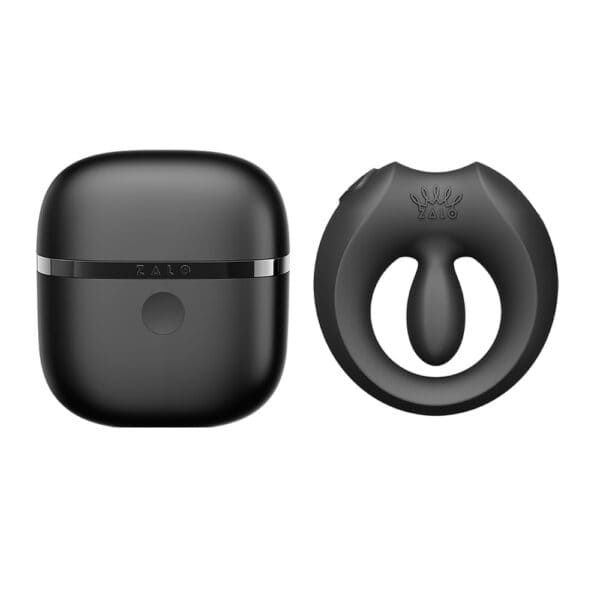 APIS connected cockring presented with its charging case, USB cable and warranty card, set against a light background in a minimalist, elegant setting.
