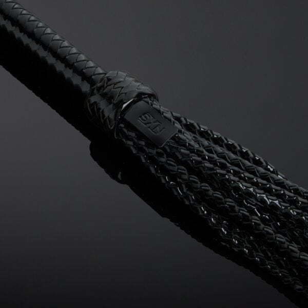 HOUSE OF SXN Black Rosa patent leather whip with multiple weaves and sheathed handle, selection Brigade Mondaine Paris