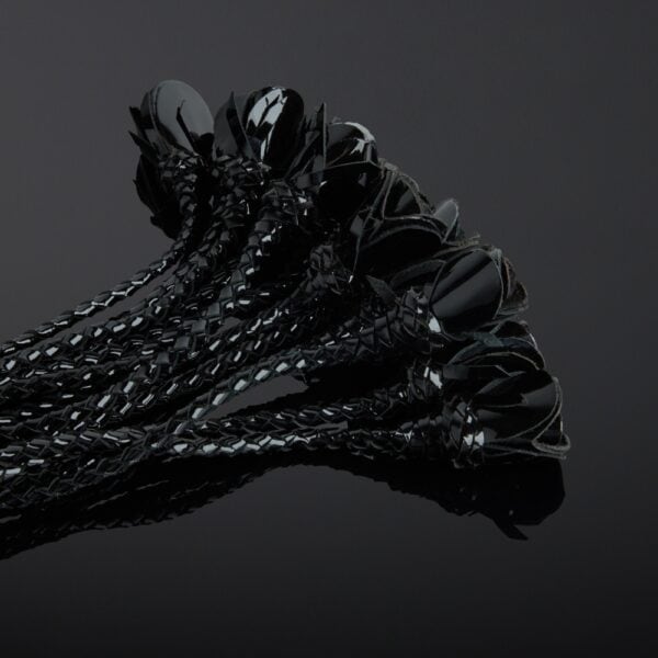 HOUSE OF SXN Black Rosa patent leather whip with multiple weaves and sheathed handle, selection Brigade Mondaine Paris