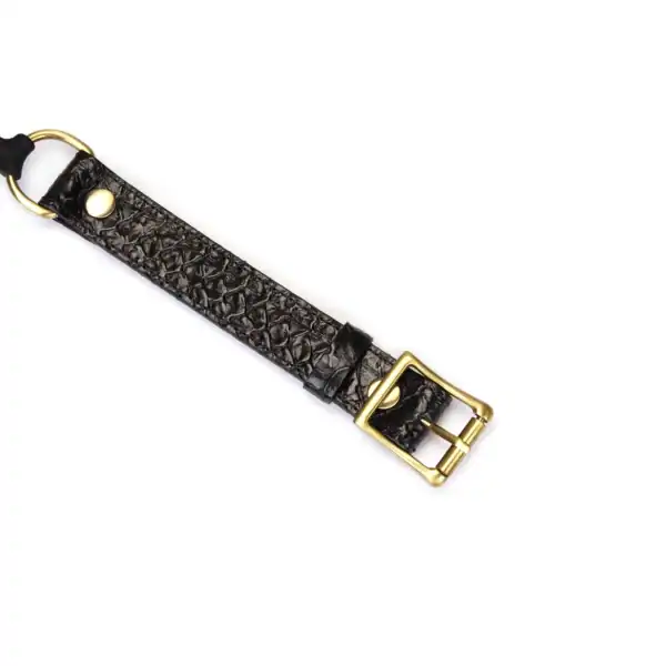 LIEBE SEELE black croc-embossed leather ball gag with black silicone ball and gold buckle, presented on a white background.