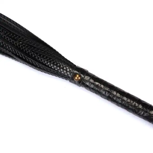 LIEBE SEELE black crocodile-embossed leather whip with sheathed handle, shown on white background