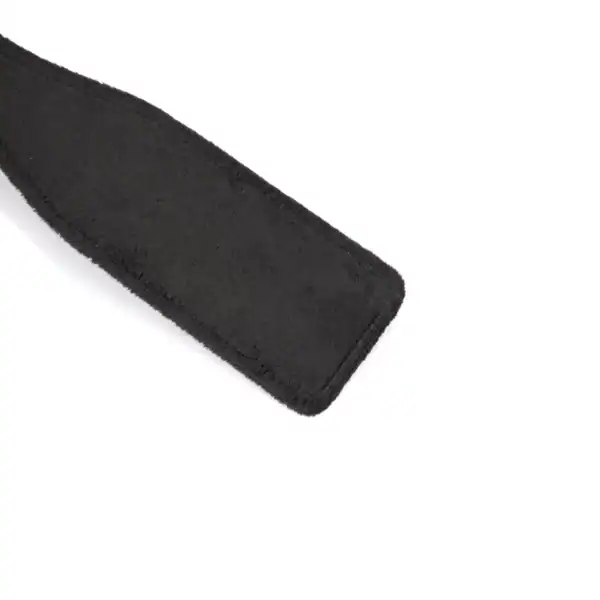 Paddle en denim de la marque Liebe Seele, à la forme allongée avec lanière de maintien, présenté sur fond clair dans l’univers Brigade Mondaine Paris.