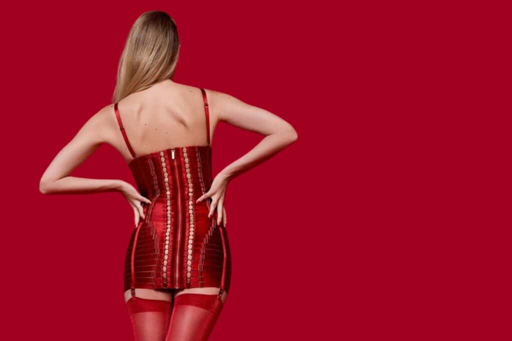 Angela BORDELLE red dress worn by a model, graphic design with signature details, selection Brigade Mondaine Paris.