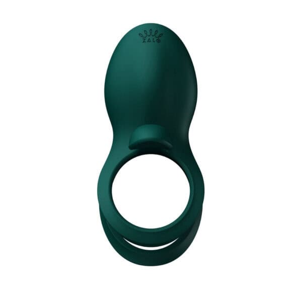 Portable vibrator with ergonomic design, presented with its box, set against a blue and red background, selection Brigade Mondaine Paris. Electric Sextoys