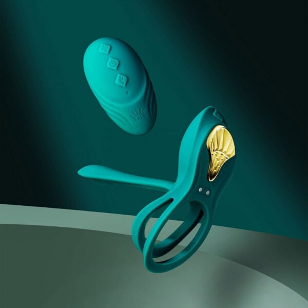 Portable vibrator with ergonomic design, presented with its box, set against a blue and red background, selection Brigade Mondaine Paris. Electric Sextoys