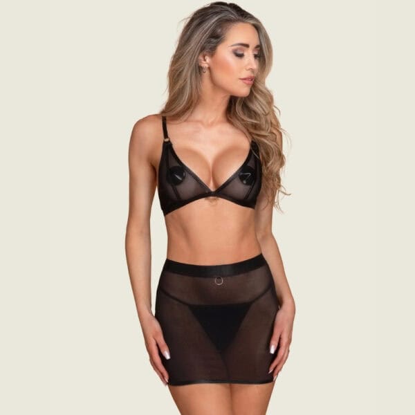 Mini-jupe en tulle noir transparent avec ouverture au dos et détail lanière.