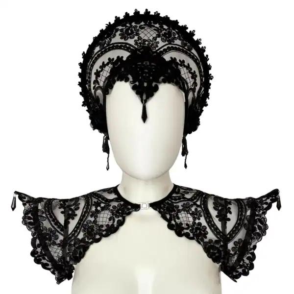VIDE NOIR Lingerie Fetish BRIGADE MONDAINE Paris (19) Handmade in Italy with custom floral embroidery on black mesh, this sculptural epaulette is reinforced with internal metal boning along the shoulder line to maintain its dramatic, elevated silhouette. Adjustable elastic bands positioned under the arms ensure comfort and stability while preserving structure. Front opening with metal clasp for a clean neckline and easy wear. Lightweight yet statement-making - a refined construction that balances delicacy and strength. Available in multiple sizes. Please refer to our size guide to select your perfect fit. This listing is for the epaulettes only. Other garments and accessories shown in photos are for styling purposes.